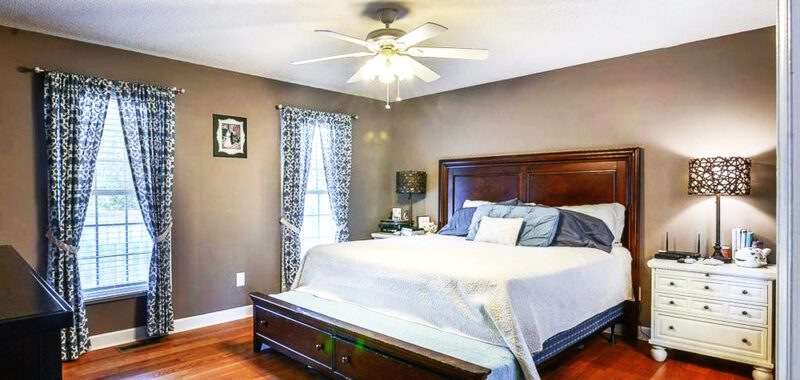Bedroom with Mocha Walls and a Dash of Classic Charm
