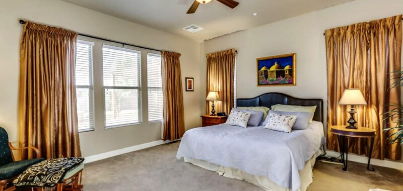 Timeless Bedroom Design with Golden Hues
