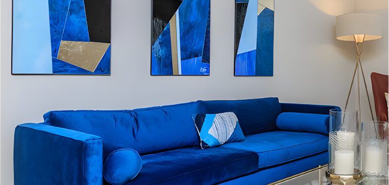 A Velvet Blue Couch That Adds Elegance and Charm