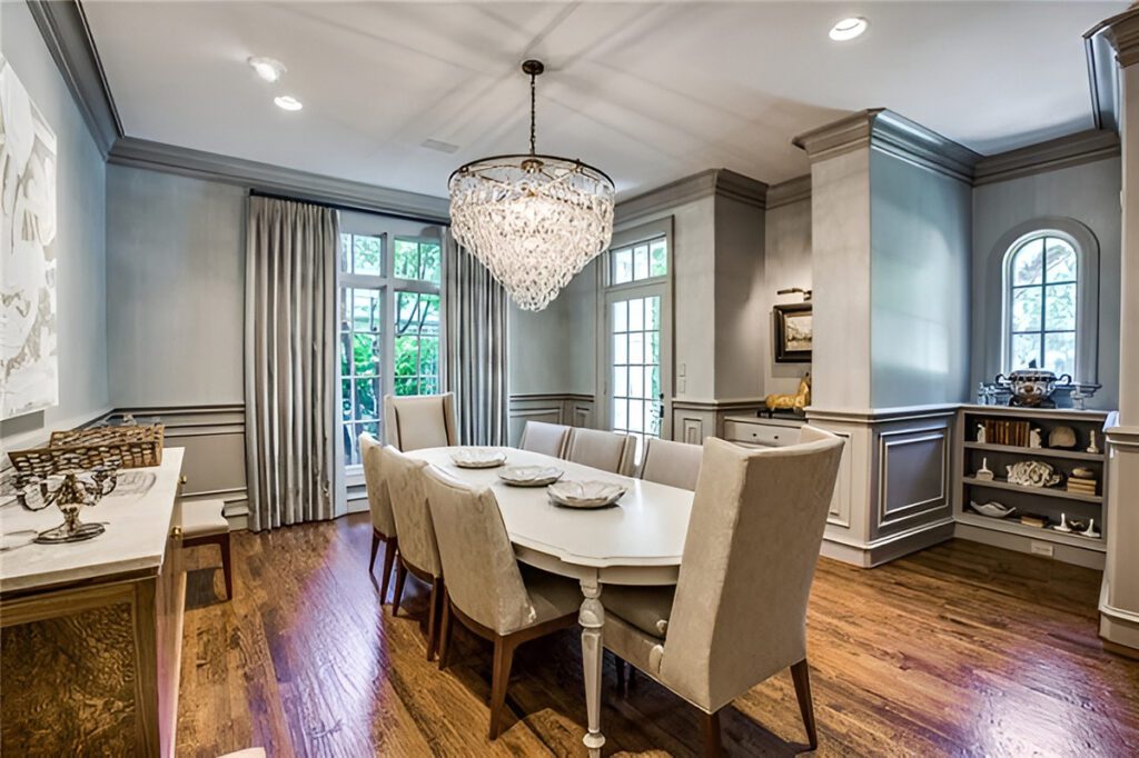 Dining Room With Rectangular Table And Crystal Chandeliers 