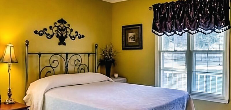 Bedroom with Yellow Walls